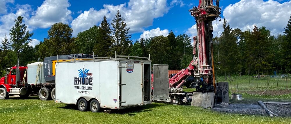 Monitoring well being installed and developed outside of Sudbury.