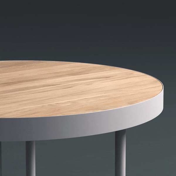 An animation showing the wooden table top lifting off and being replaced by a cork top and then a terrazzo top