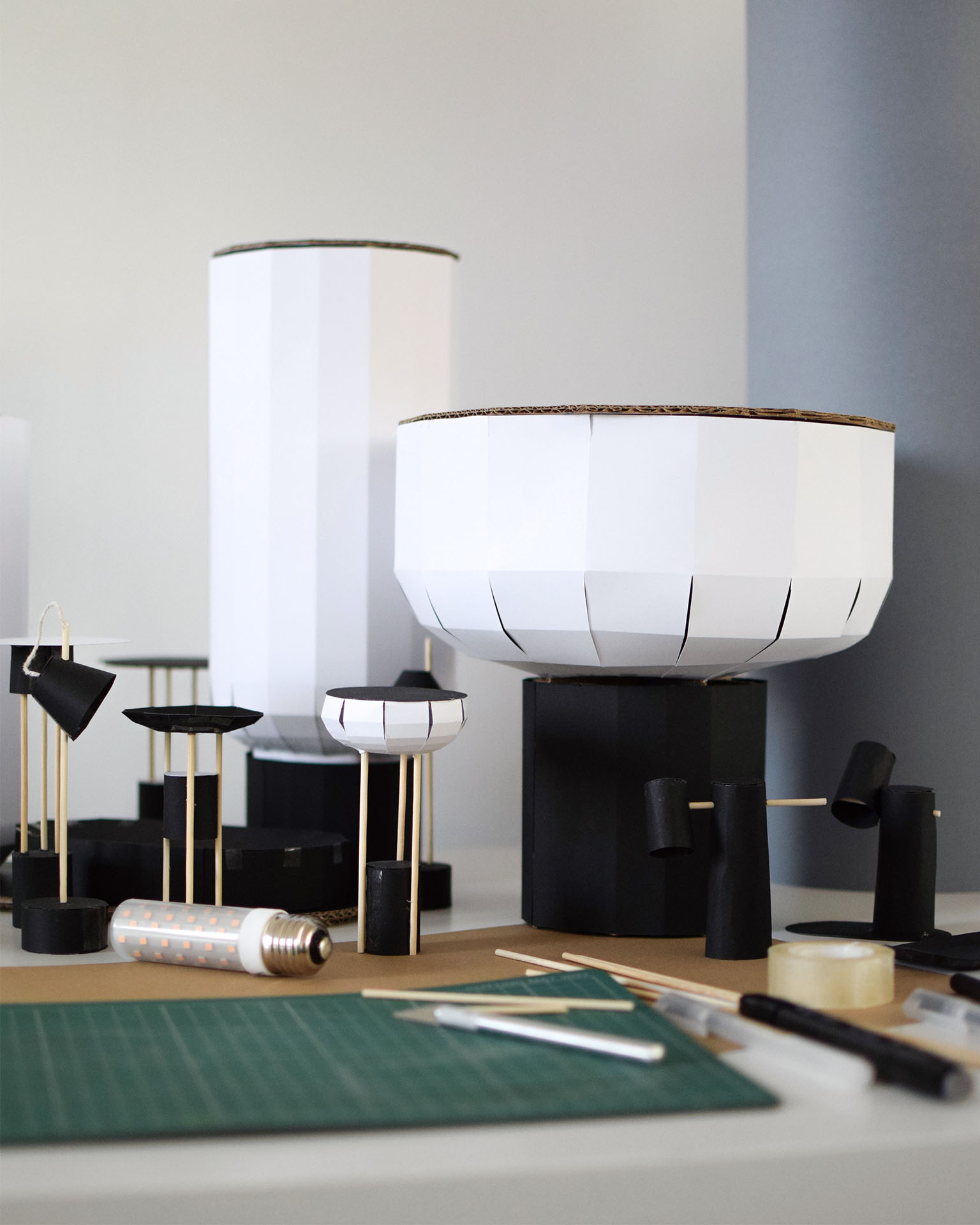A collection of paper prototypes from the development process