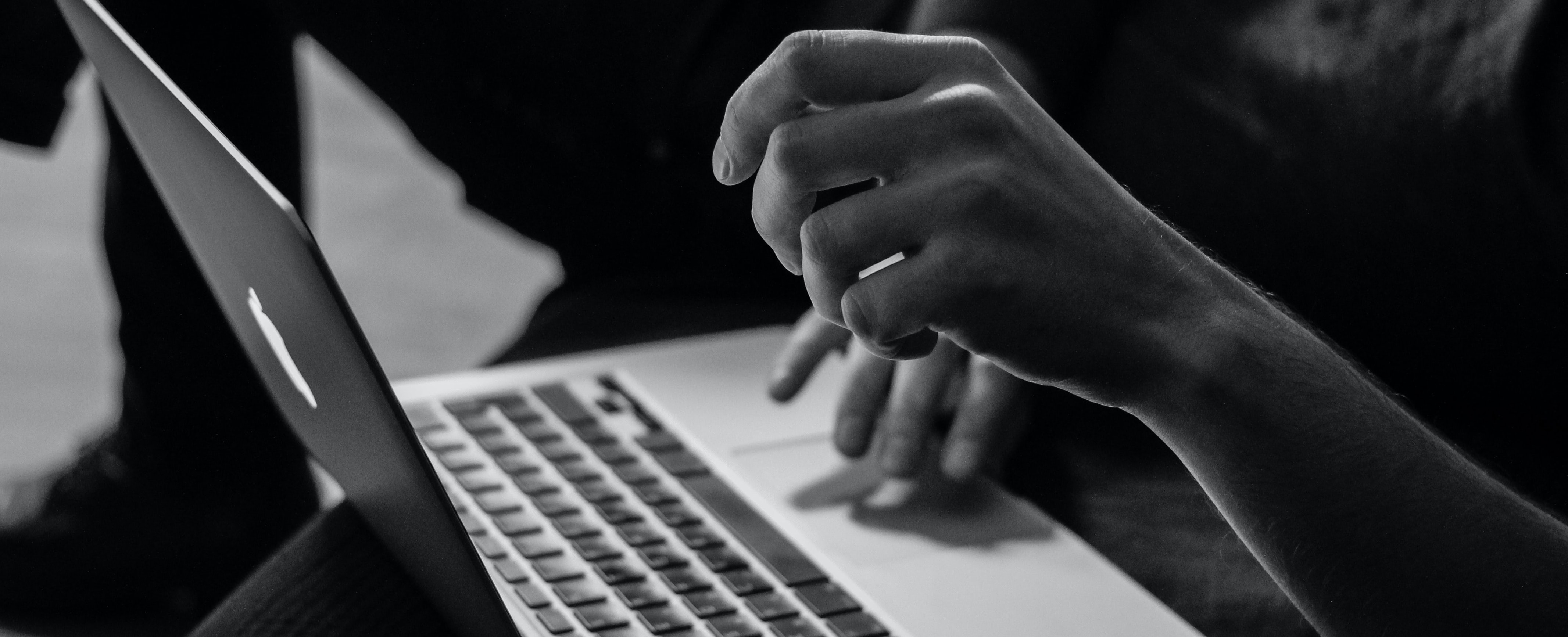 Person typing on a laptop