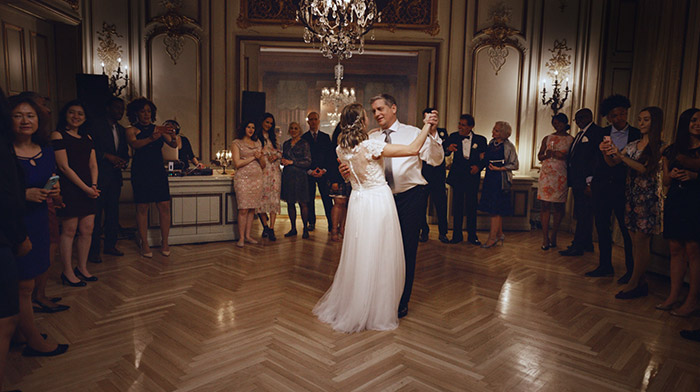 Mass Mutial commercial still of father and daughter dancing at daughter's wedding