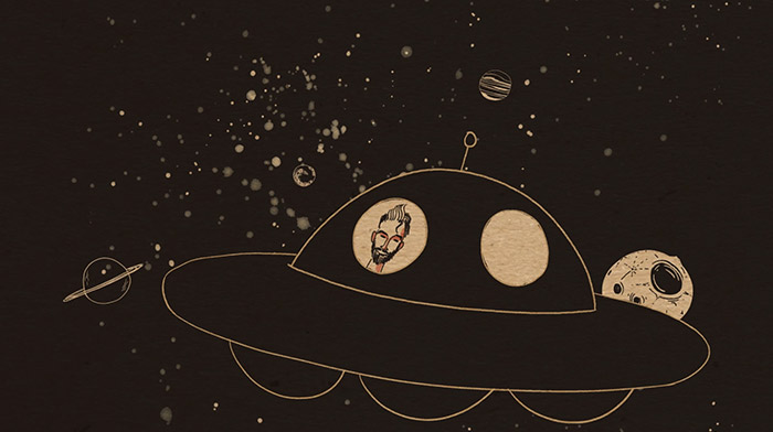 Mailchimp commercial still of animation depicting an UFO floating in space