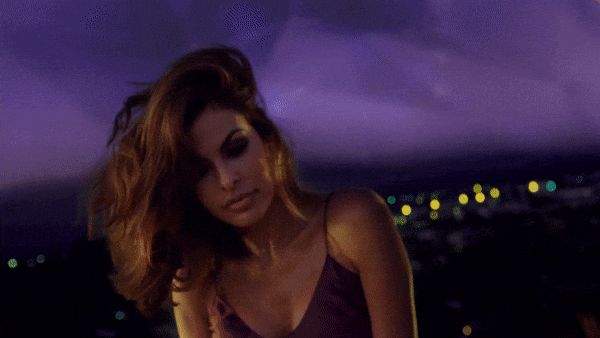 Avon commercial still of actress Eva Mendez looking into the camera