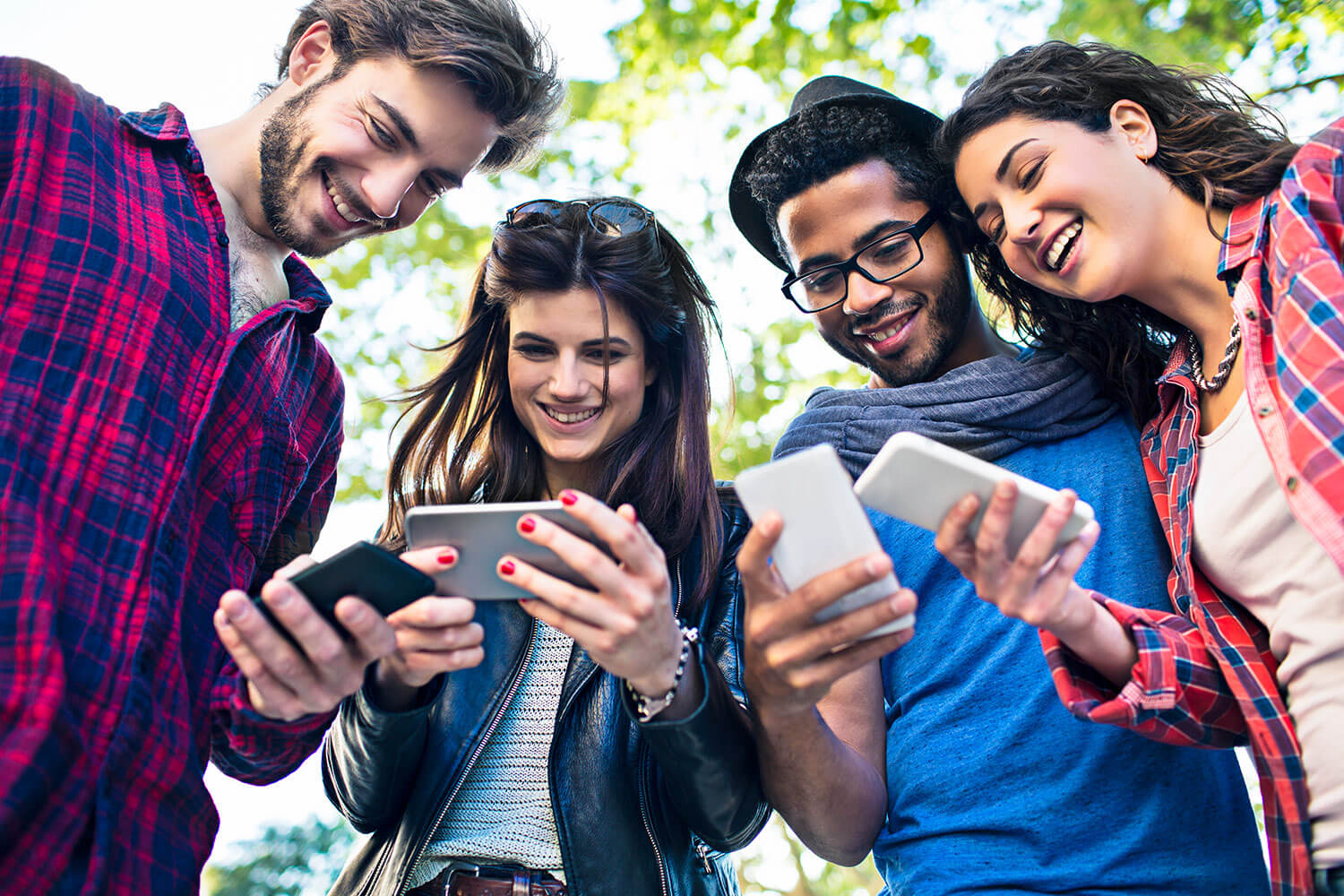 Group of people staring at their phones