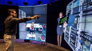 Remote locations collaborating through Visionary Render and Video Teleconferencing to create a global collaborative infrastructure
