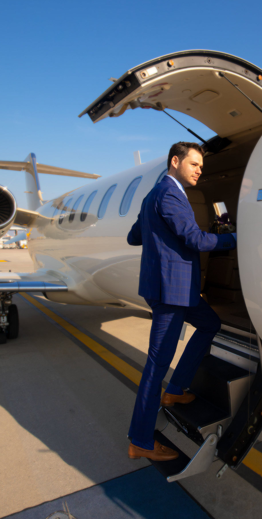 Man entering private jet