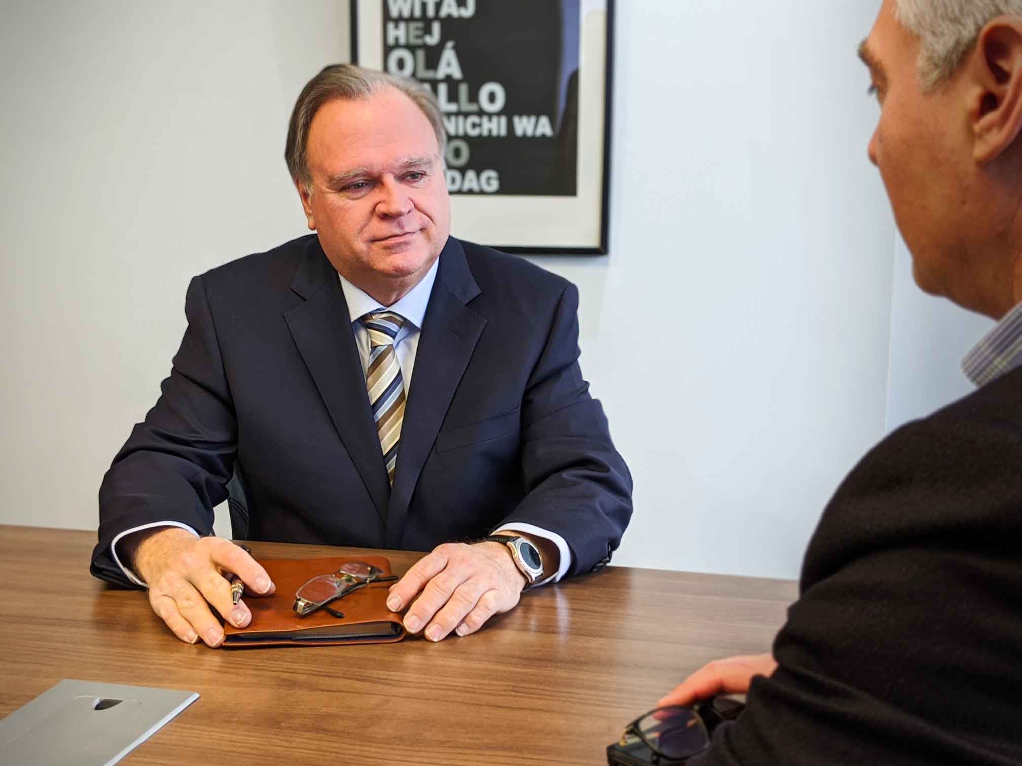Alex McPhail, President & CEO of EXA speaks with a client