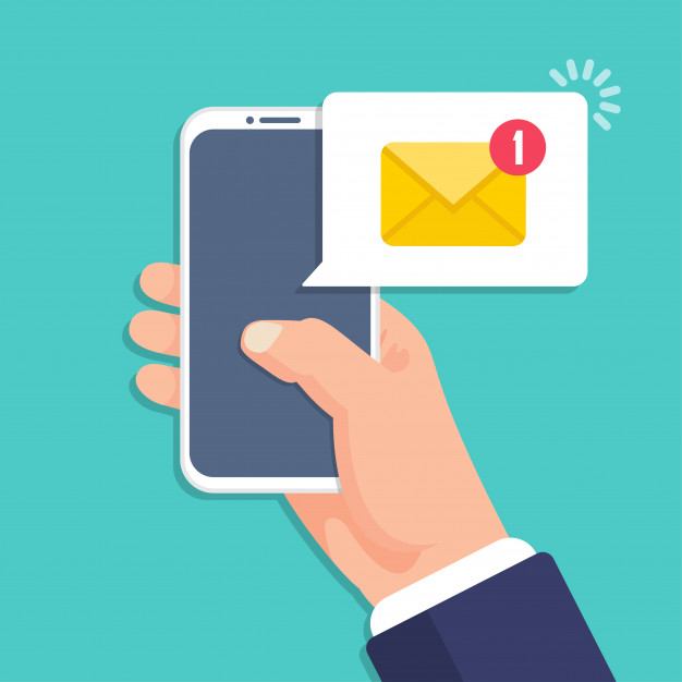 Hand holding smartphone with email message notification in a flat design Premium Vector