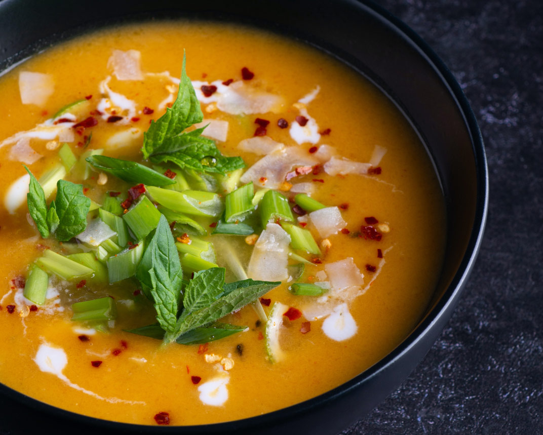 A bowl of soup on a table