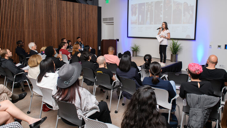Daniela Golborne of ICA Accelerator company Progeny Coffee pitching at a pitch event in 2019. Click the images for more photos.