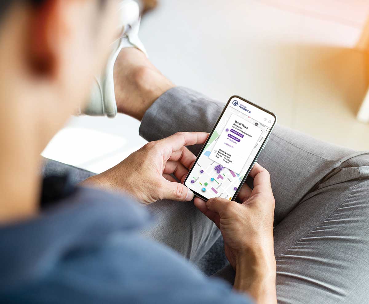 Man using Spot Local parking web app on his mobile device