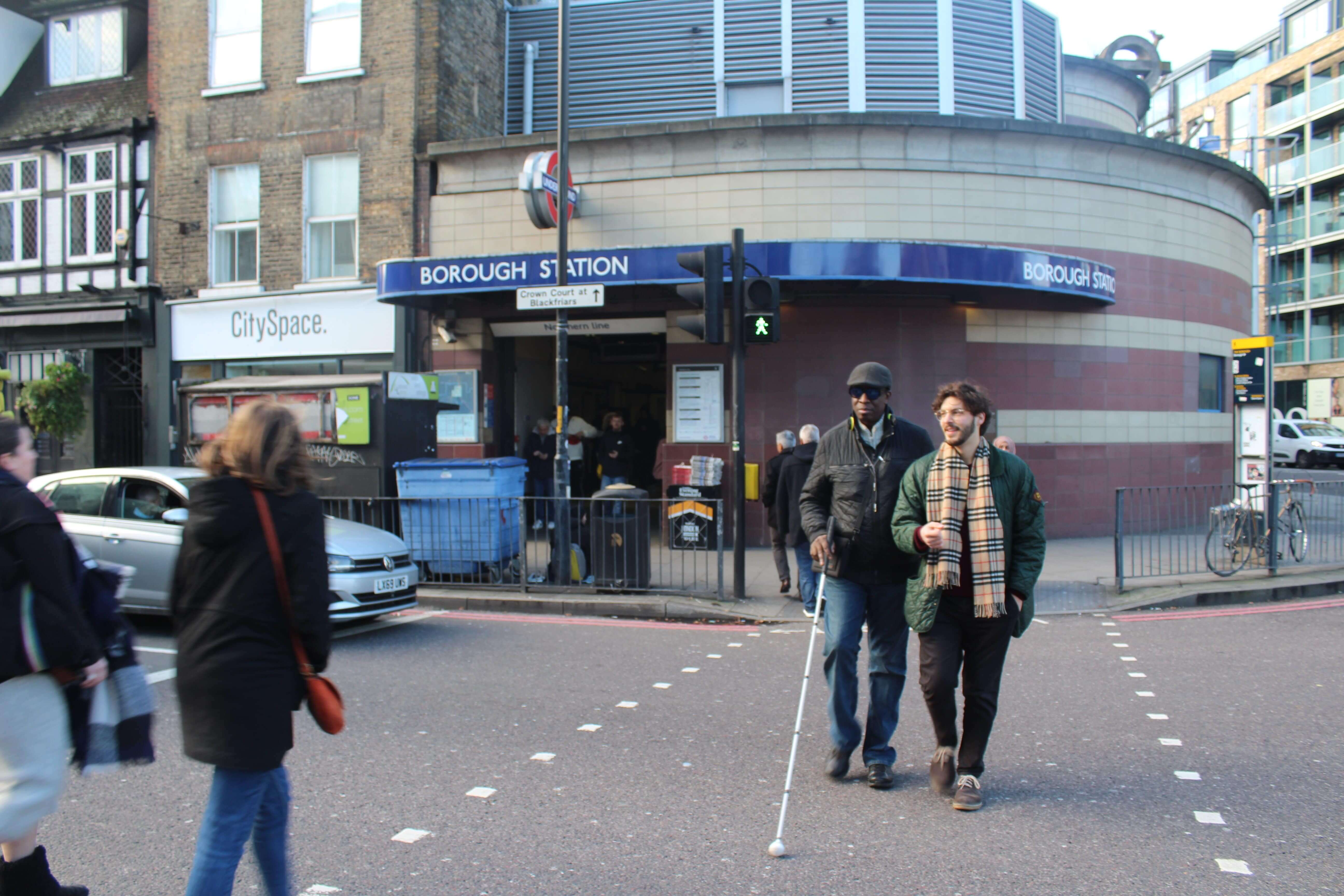 Tube station - the first step of travel visually impaired person with volunteer