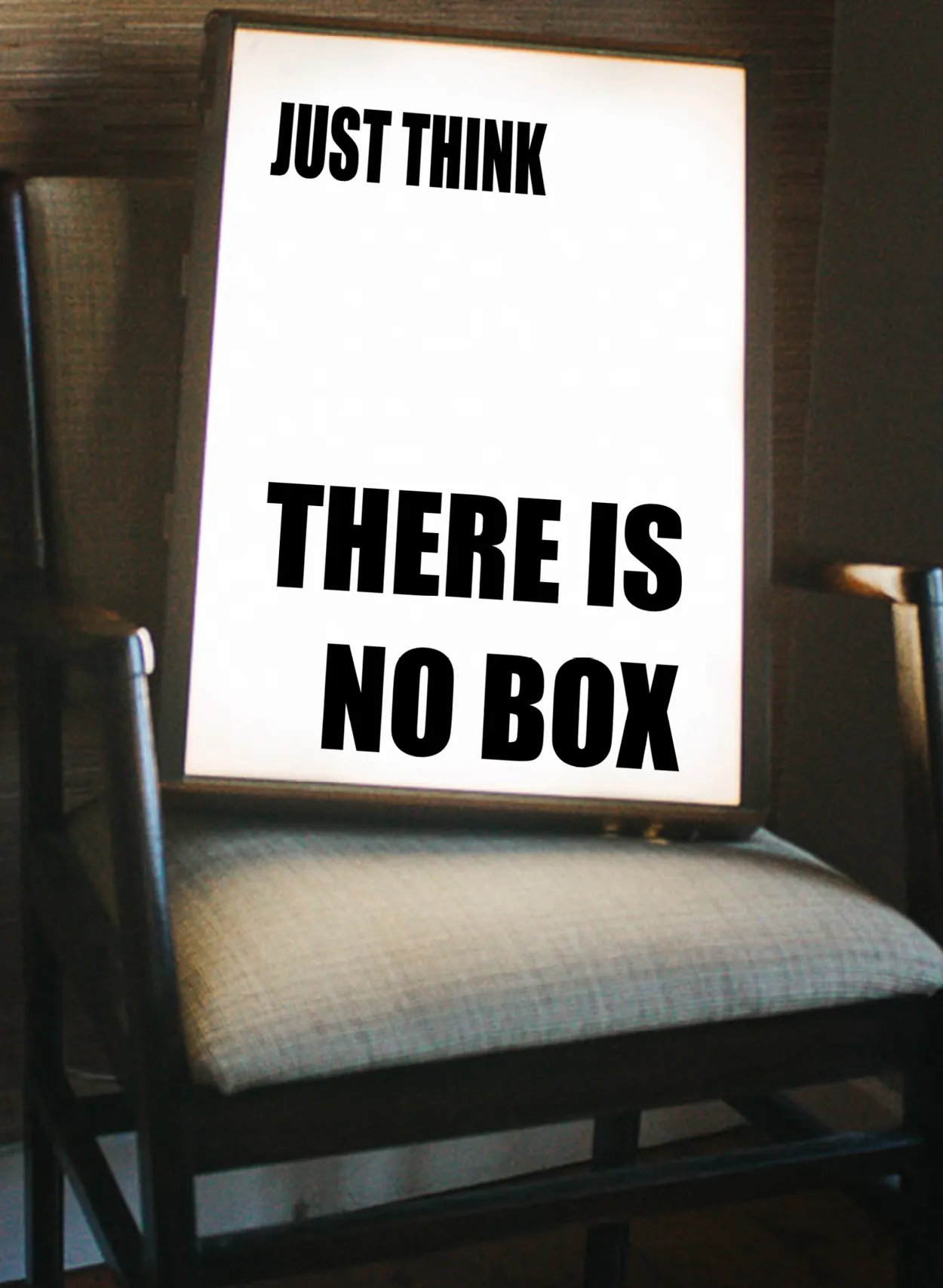 A lightbox that says "Just Think, There Is No Box"