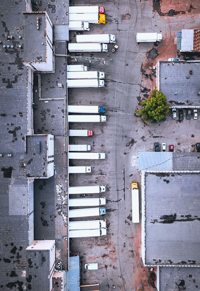 overhead view of parked delivery trucks