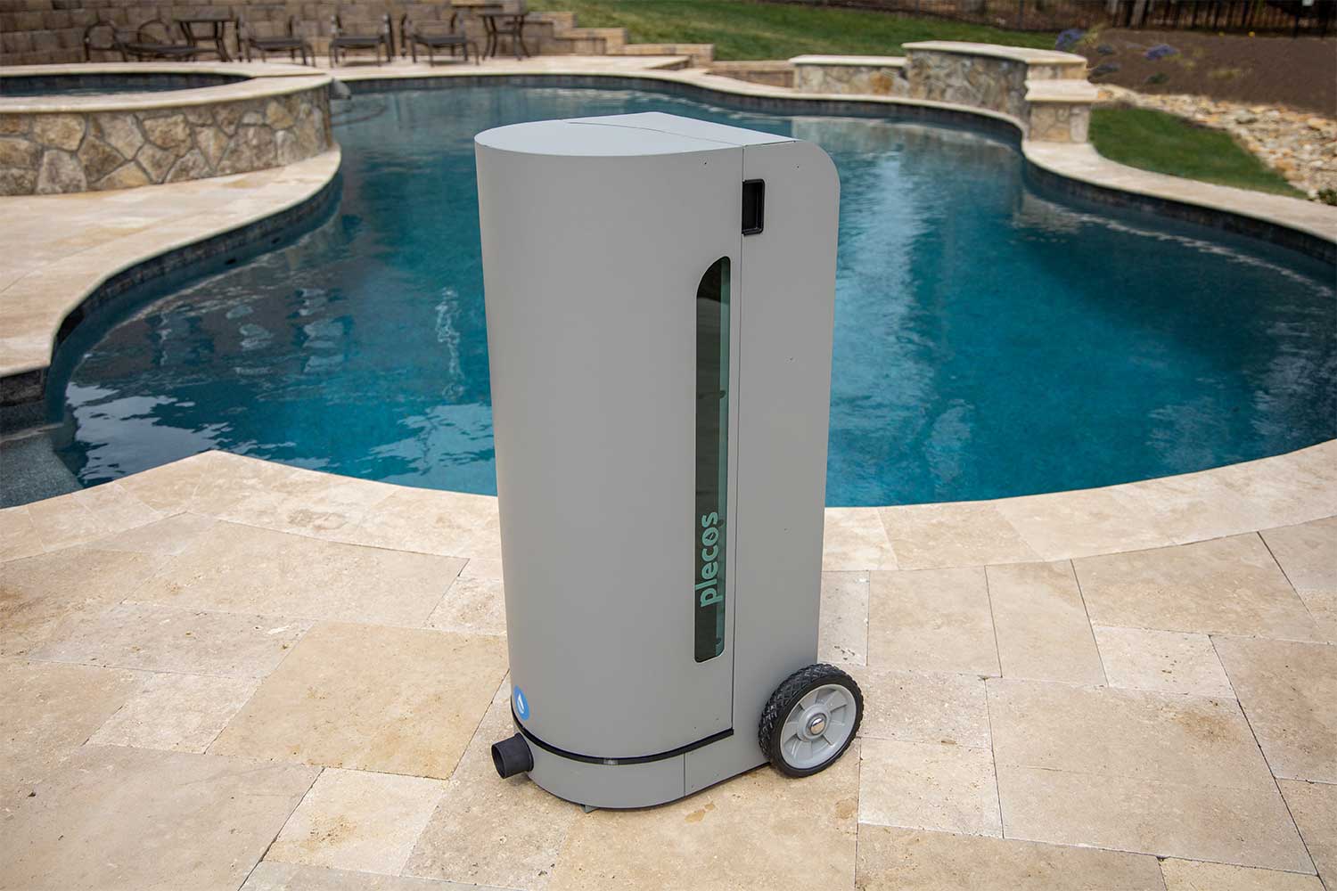 Image of CleanSweep product in front of a residential pool.