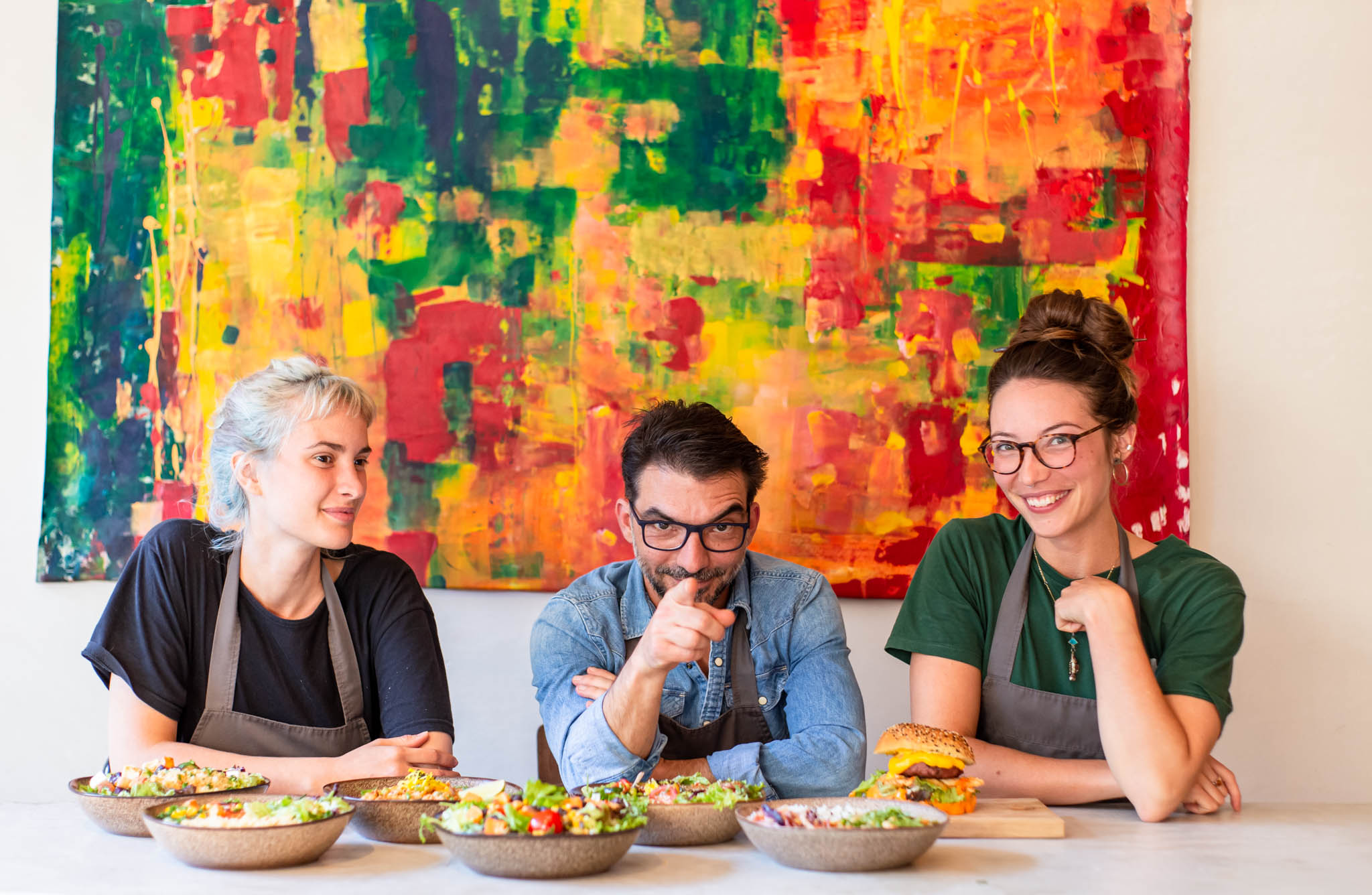 Soil's restaurant owner with two staff members