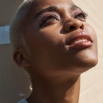 Headshot of Shauna Davis looking towards the sky