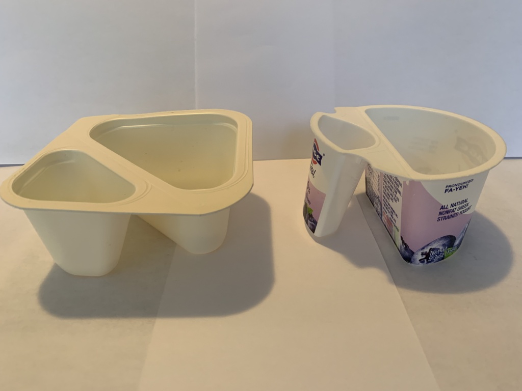 Two empty flip yogurt containers