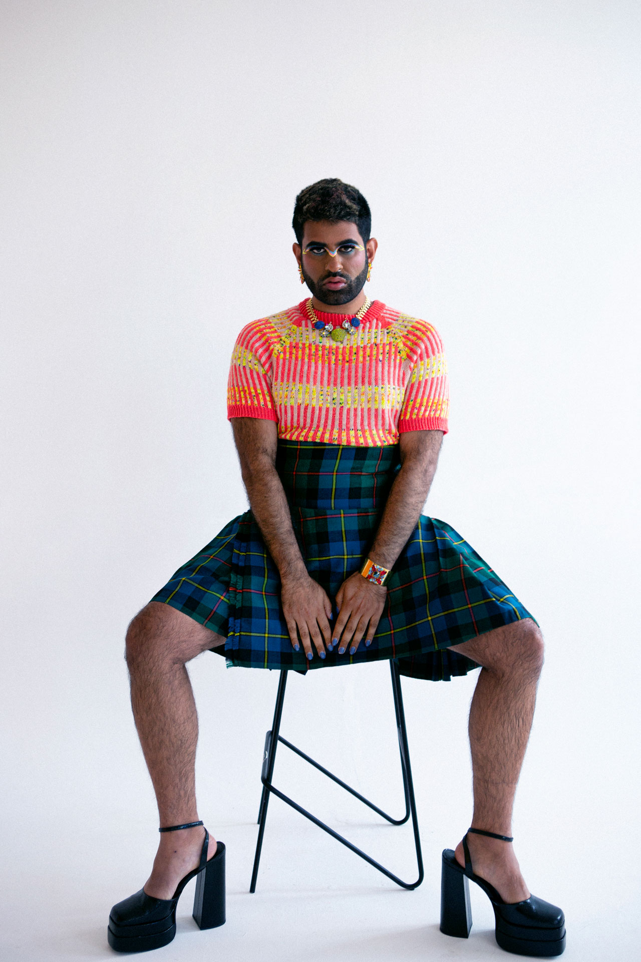 Alok wearing Lydia Morrow's handknitted sweater