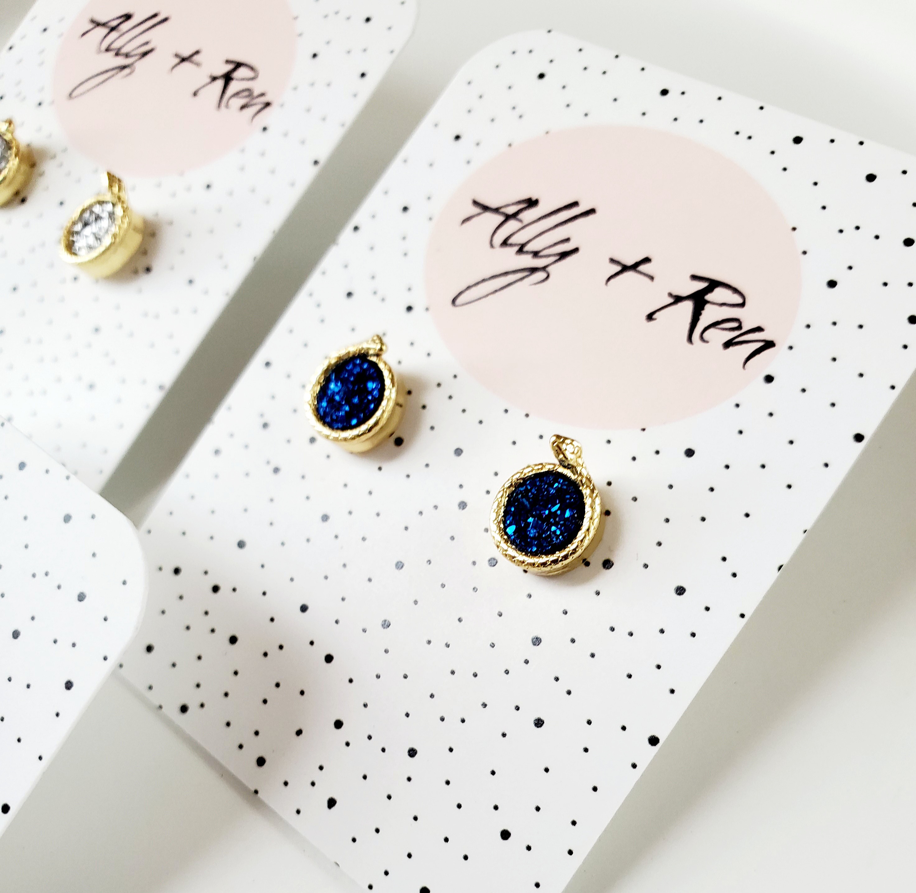 2 pairs of navy and clear crystal druzy studs