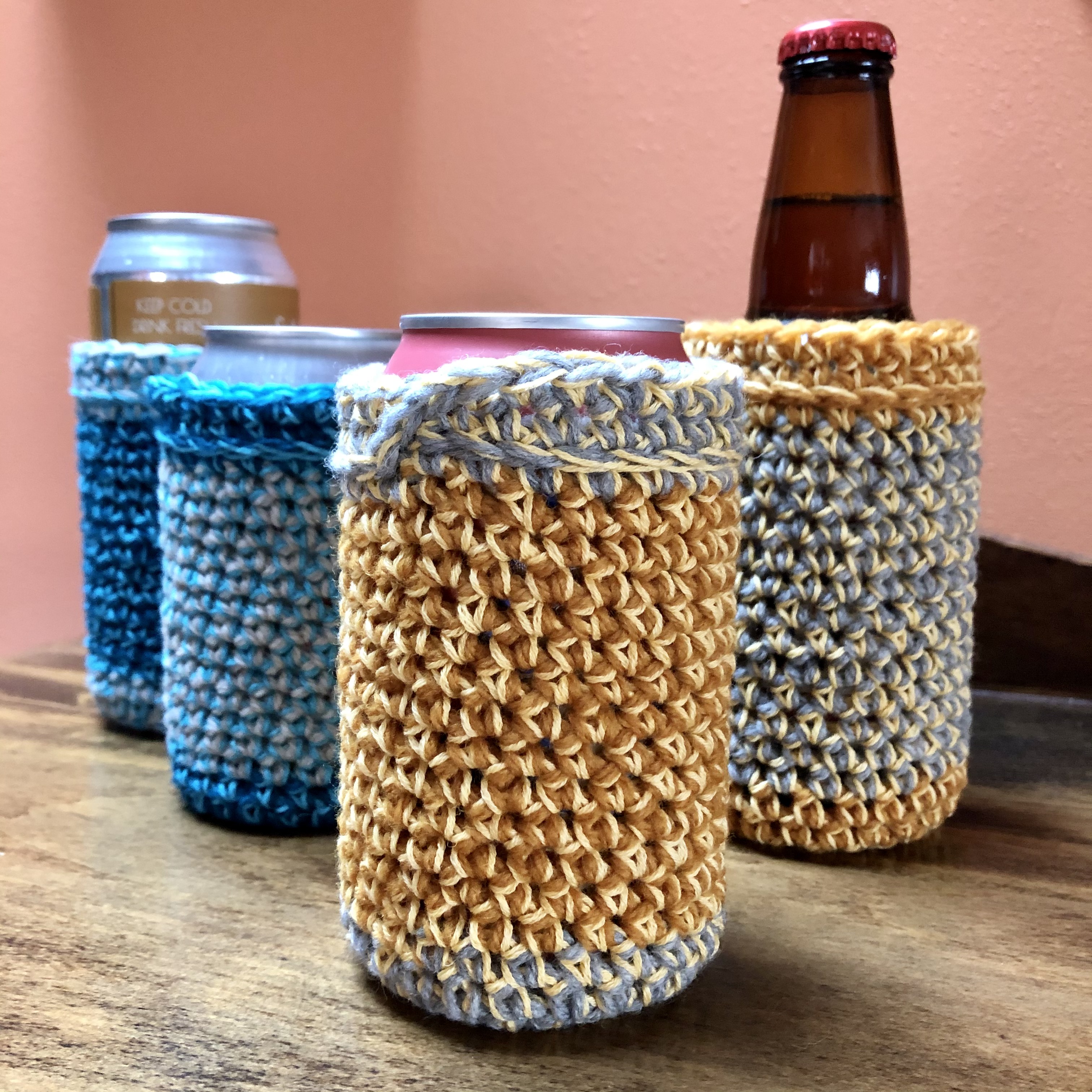 Four can/bottle koozies