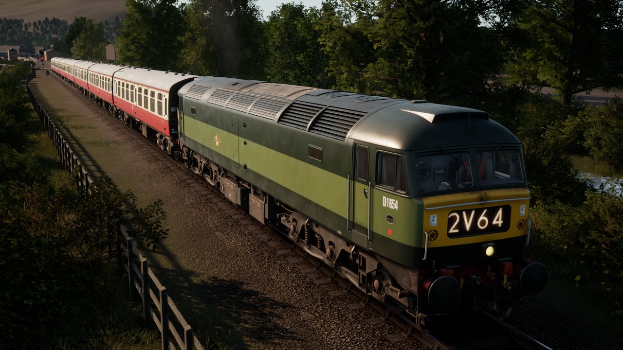 A Class 47 pulls a rake of coaches out of Minehead station.