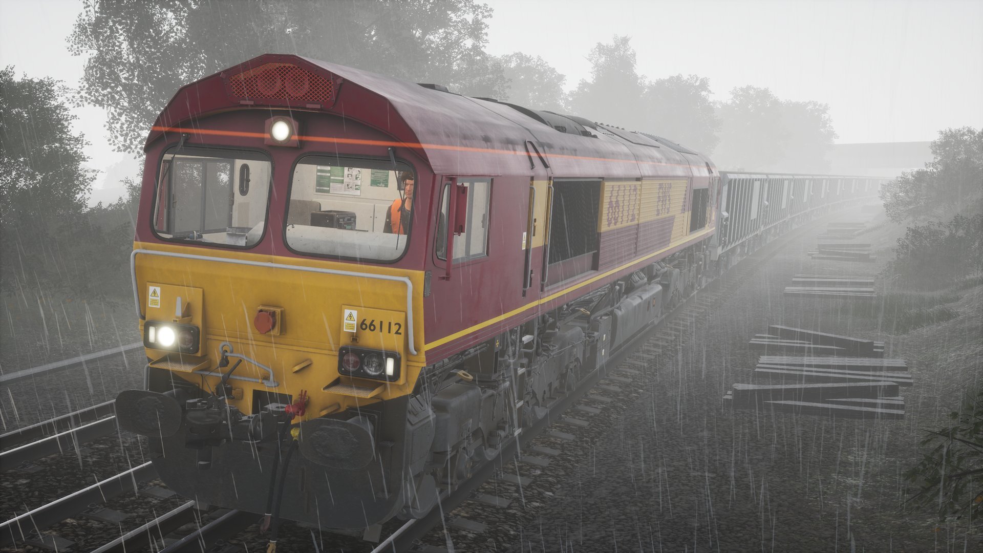 A Class 166 hauls an empty rake of trucks back to Newhaven.