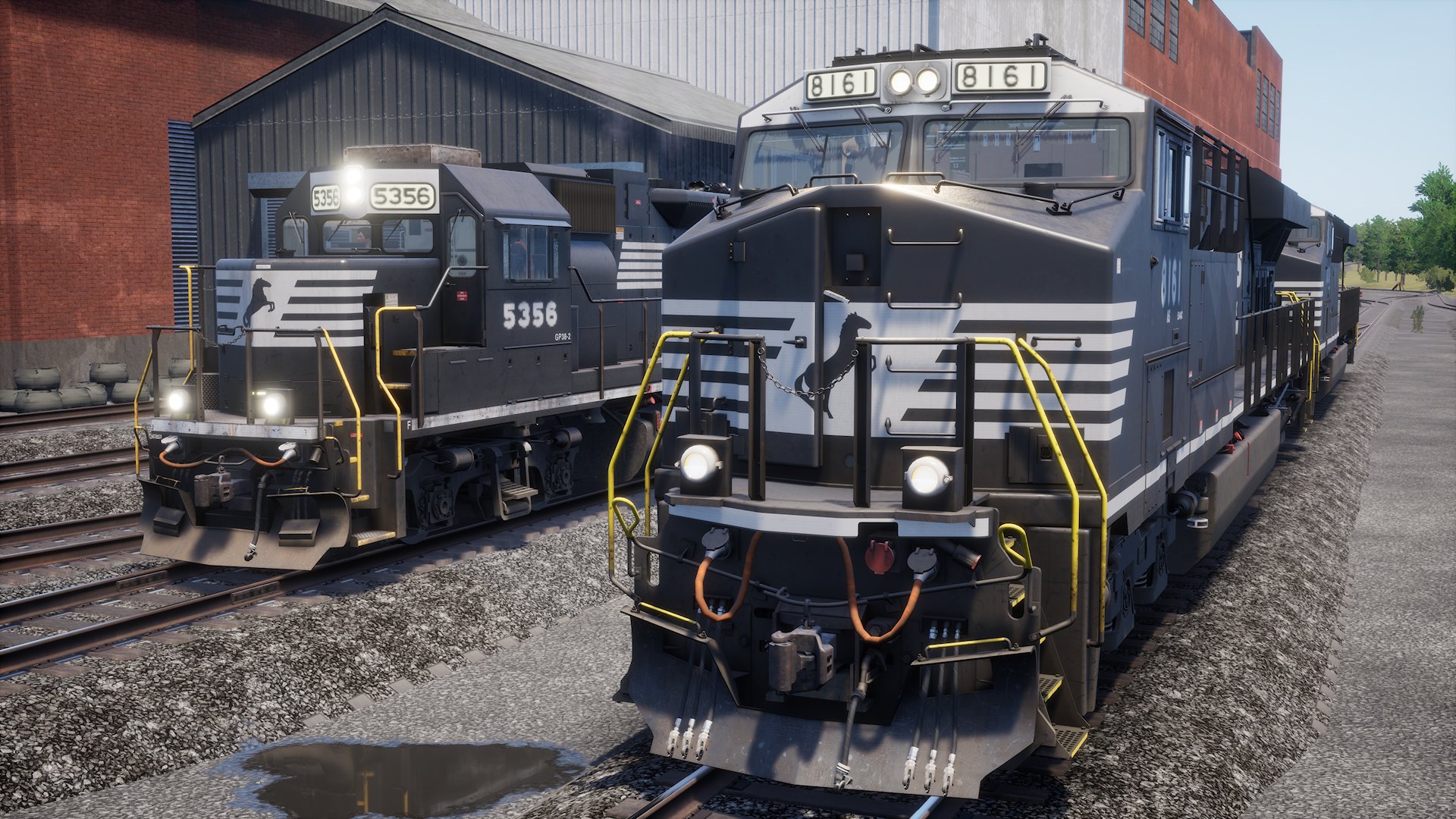 EMD GP38-2 and a GE ES44AC locomotives side by side.