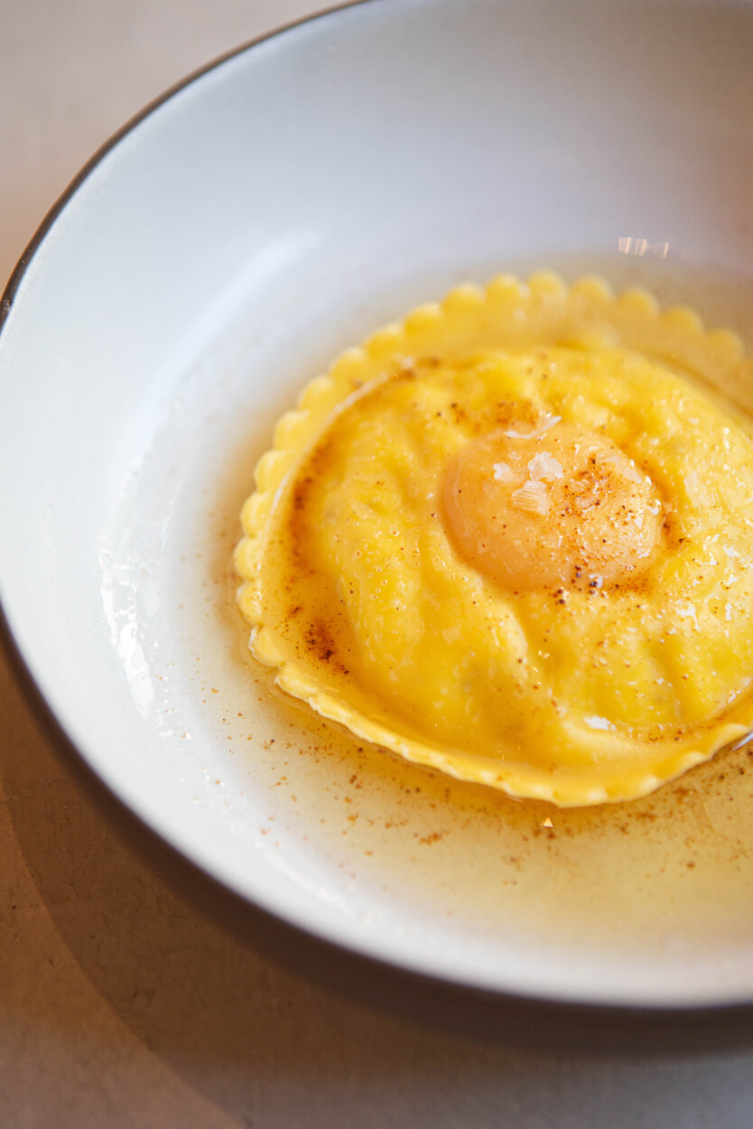 View of the outdoor dining space in front of the Cotogna restaurant
