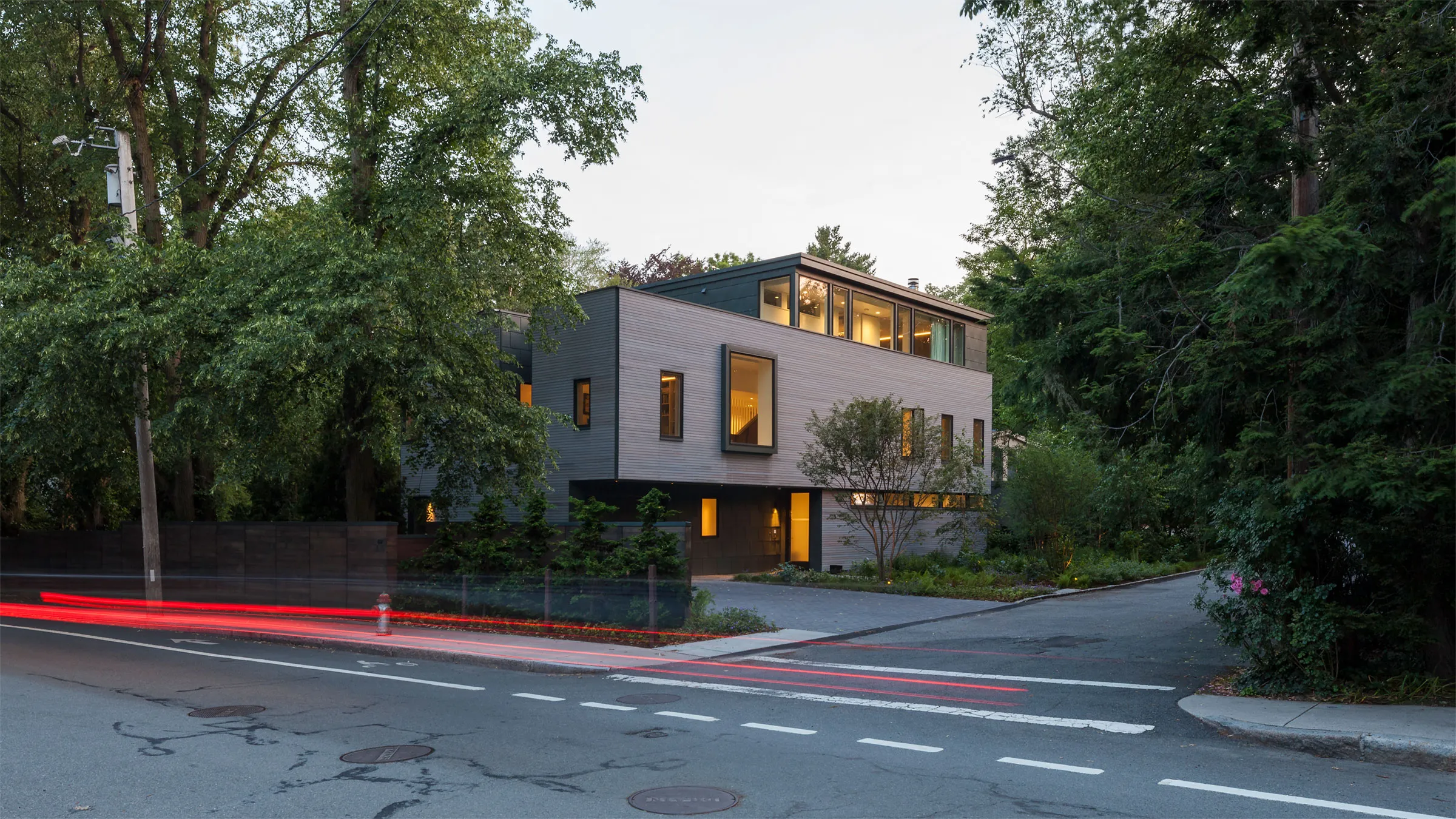 Outside view of a contemporary home near sunset.