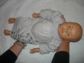 How to lift an infant