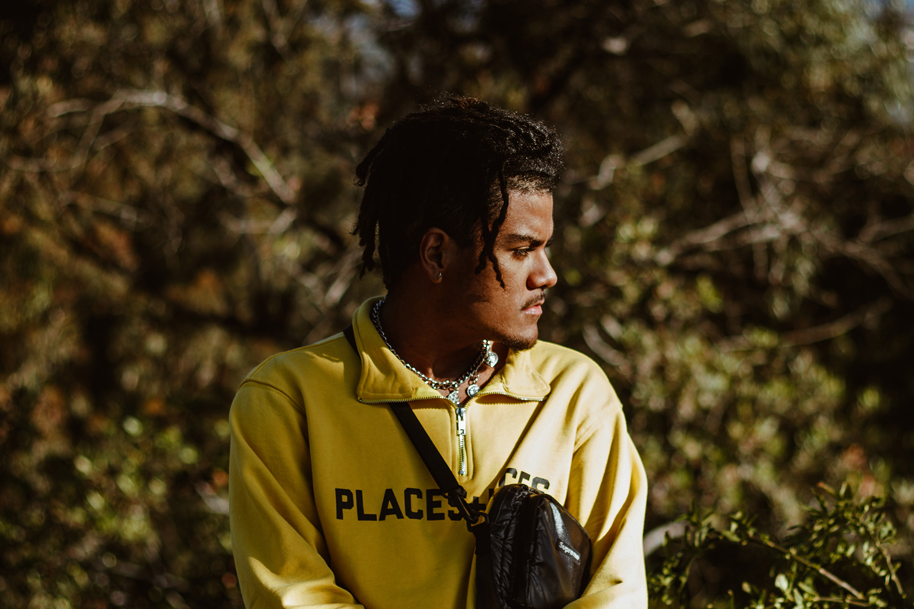 Troi Blank looking to his left side. 