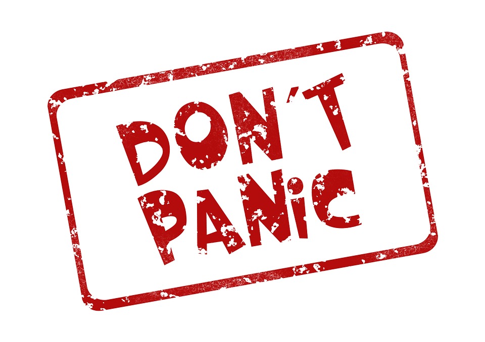 red stamped letters read DON'T PANIC