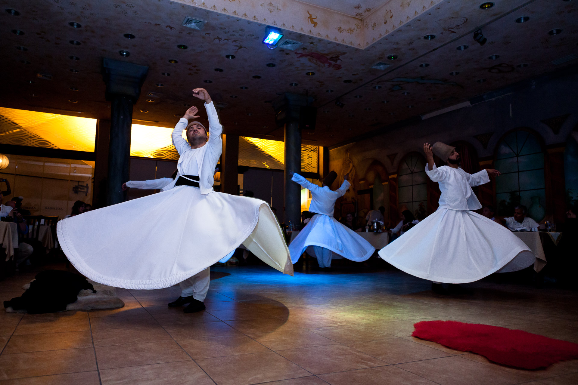 Turkish dancers in an indoor setting