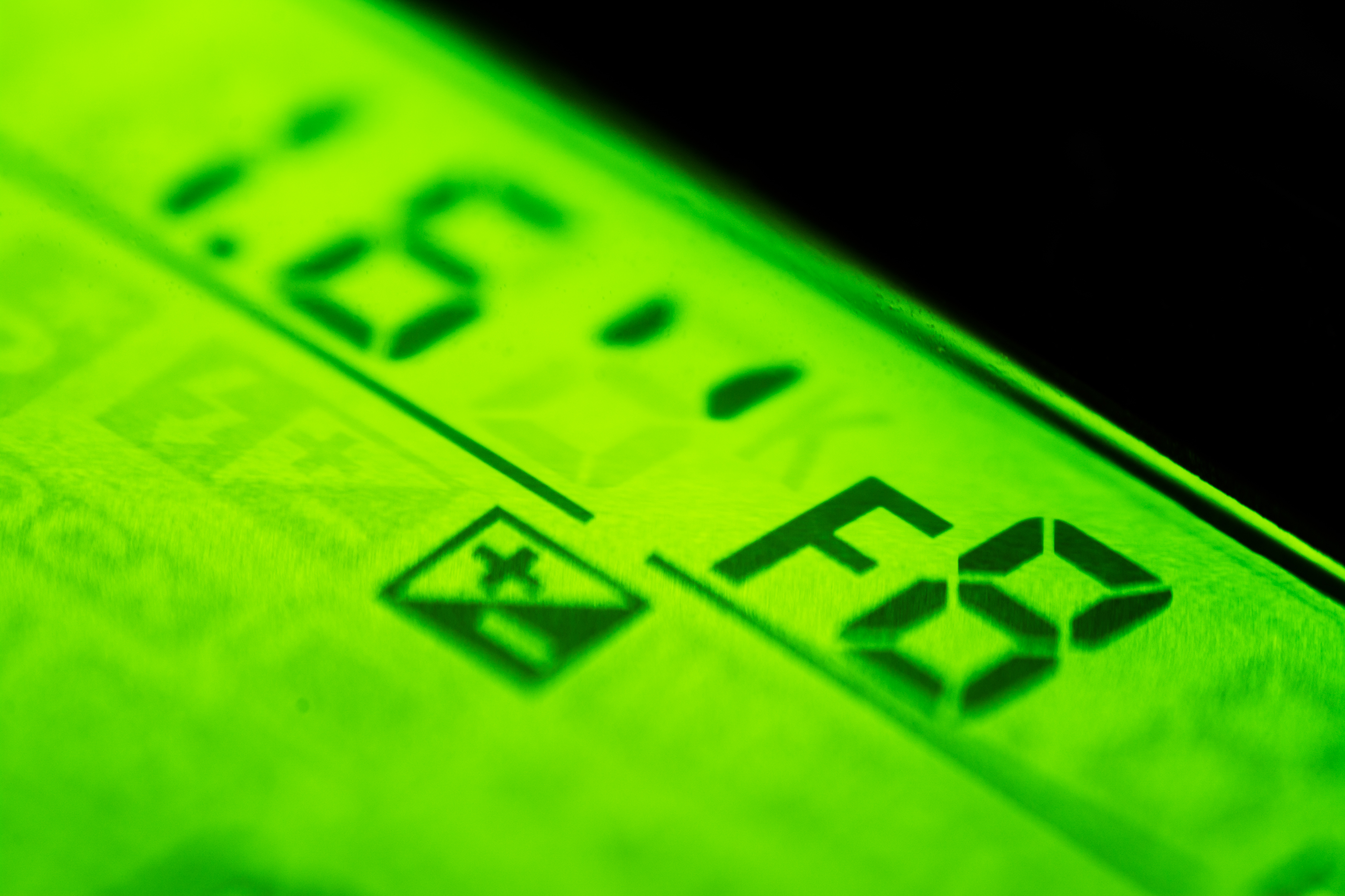 Closeup on reflex camera top LCD display with f-stop indication