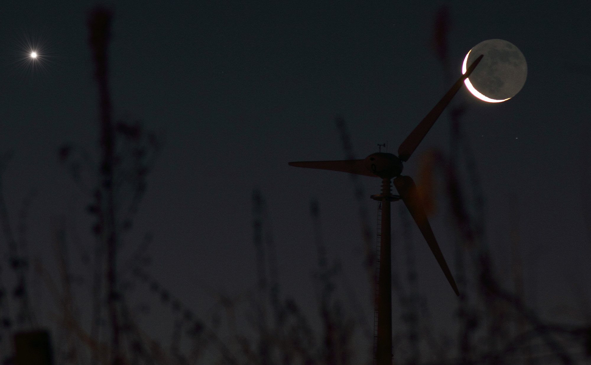 A young crescent Moon and the planet Venus.