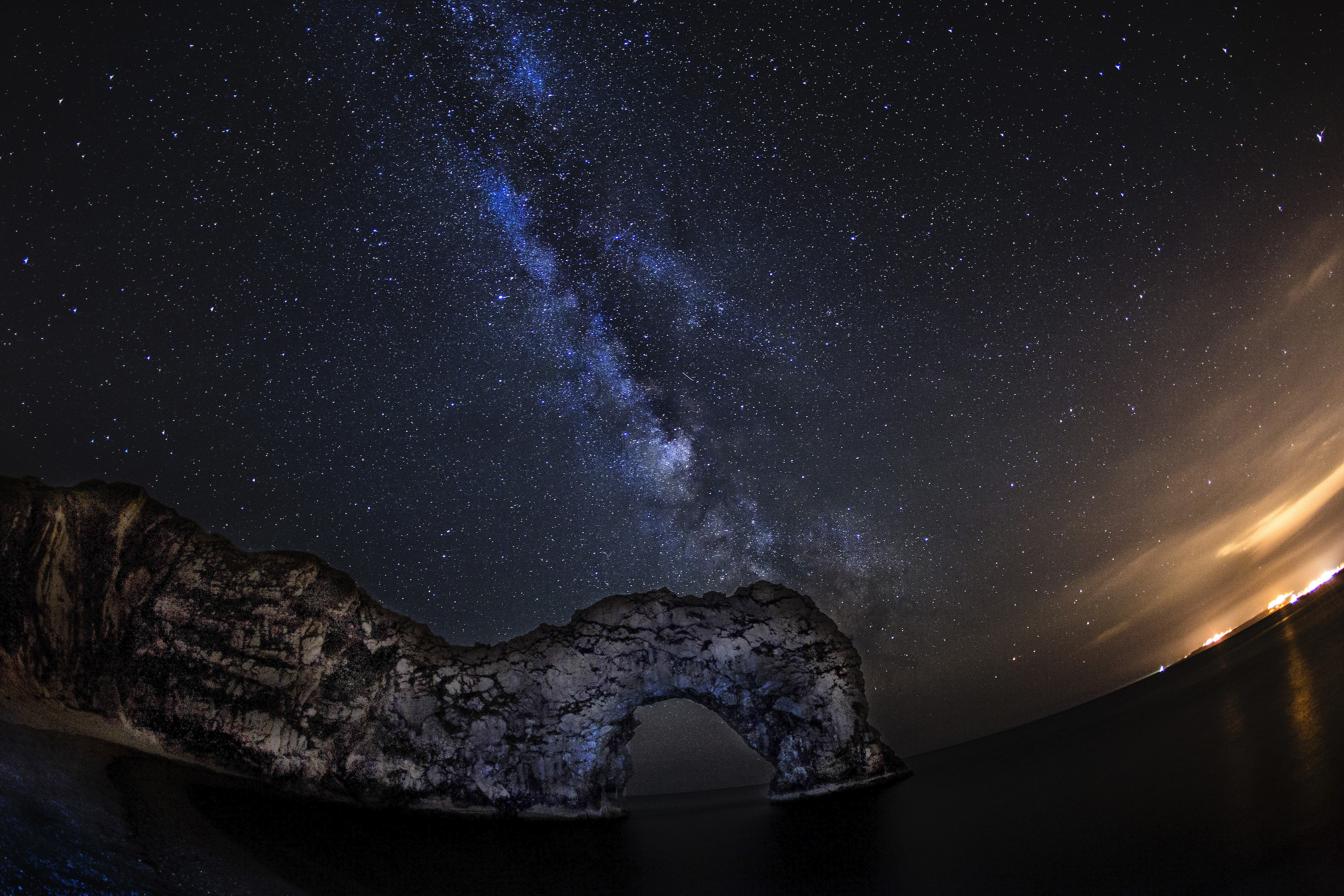 Milky Way over Durdle Door seen through a Fisheye lens.