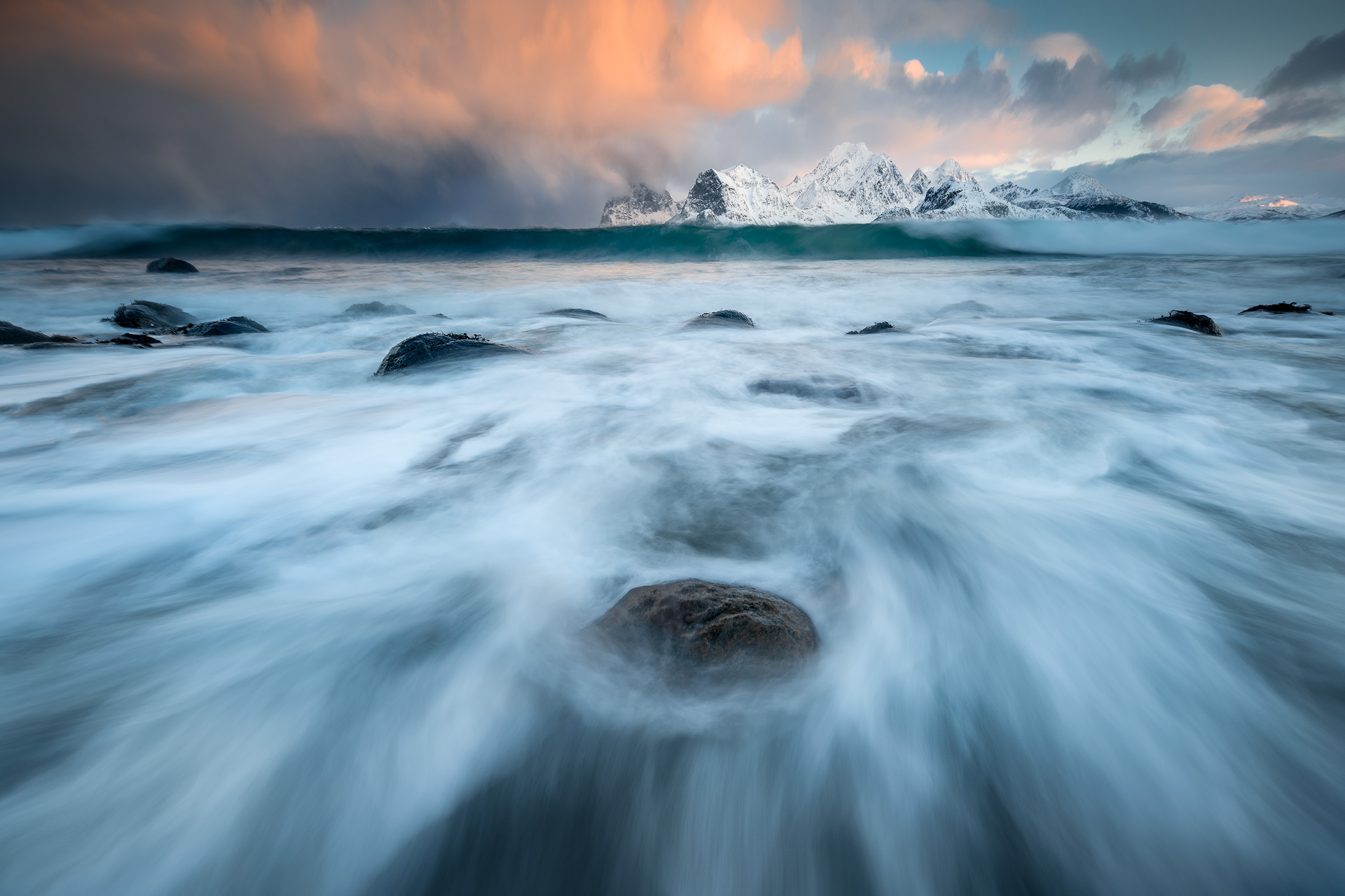 Wintry seascape from a low-down perspective with crashing waves