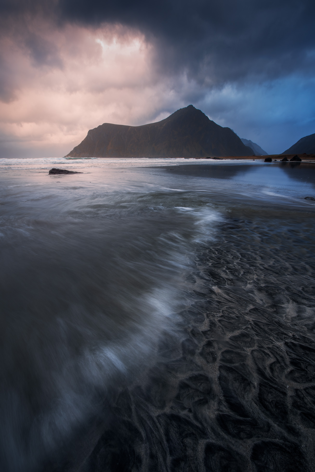 Seascape at Lofoten with waves in the foreground