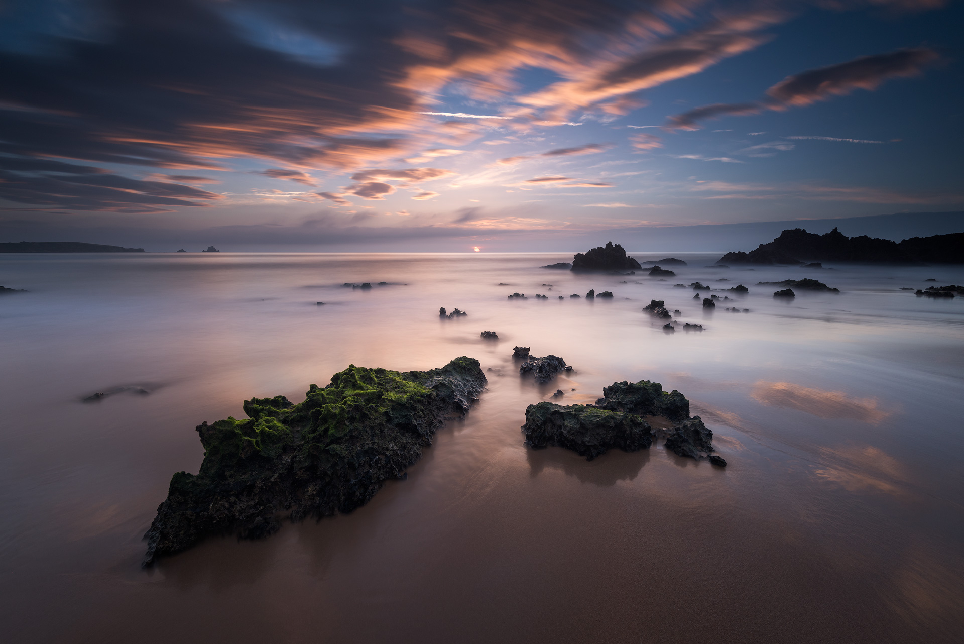 Seascape with rocks in the foreground