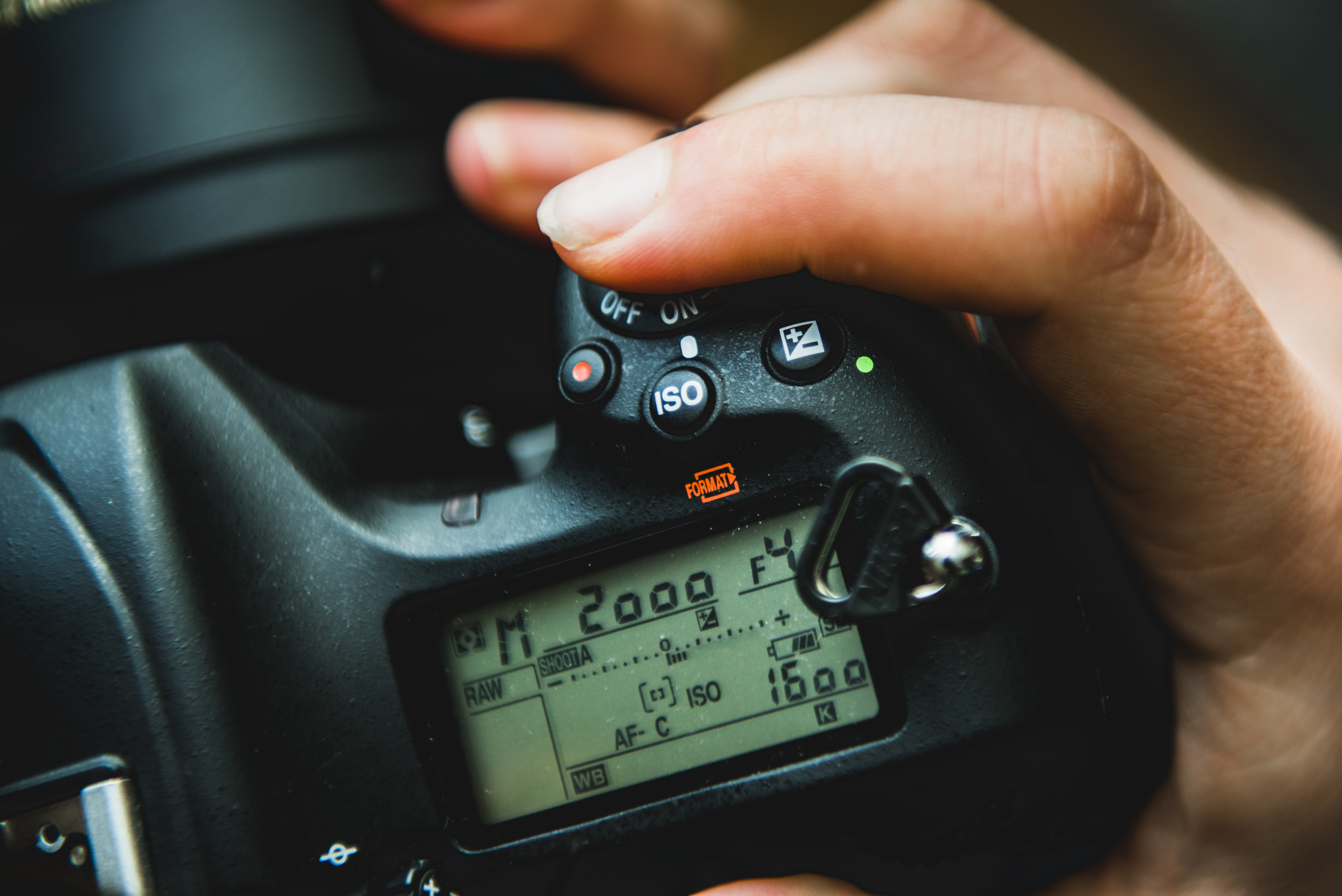 Digital view of camera settings on top of a DLSR camera