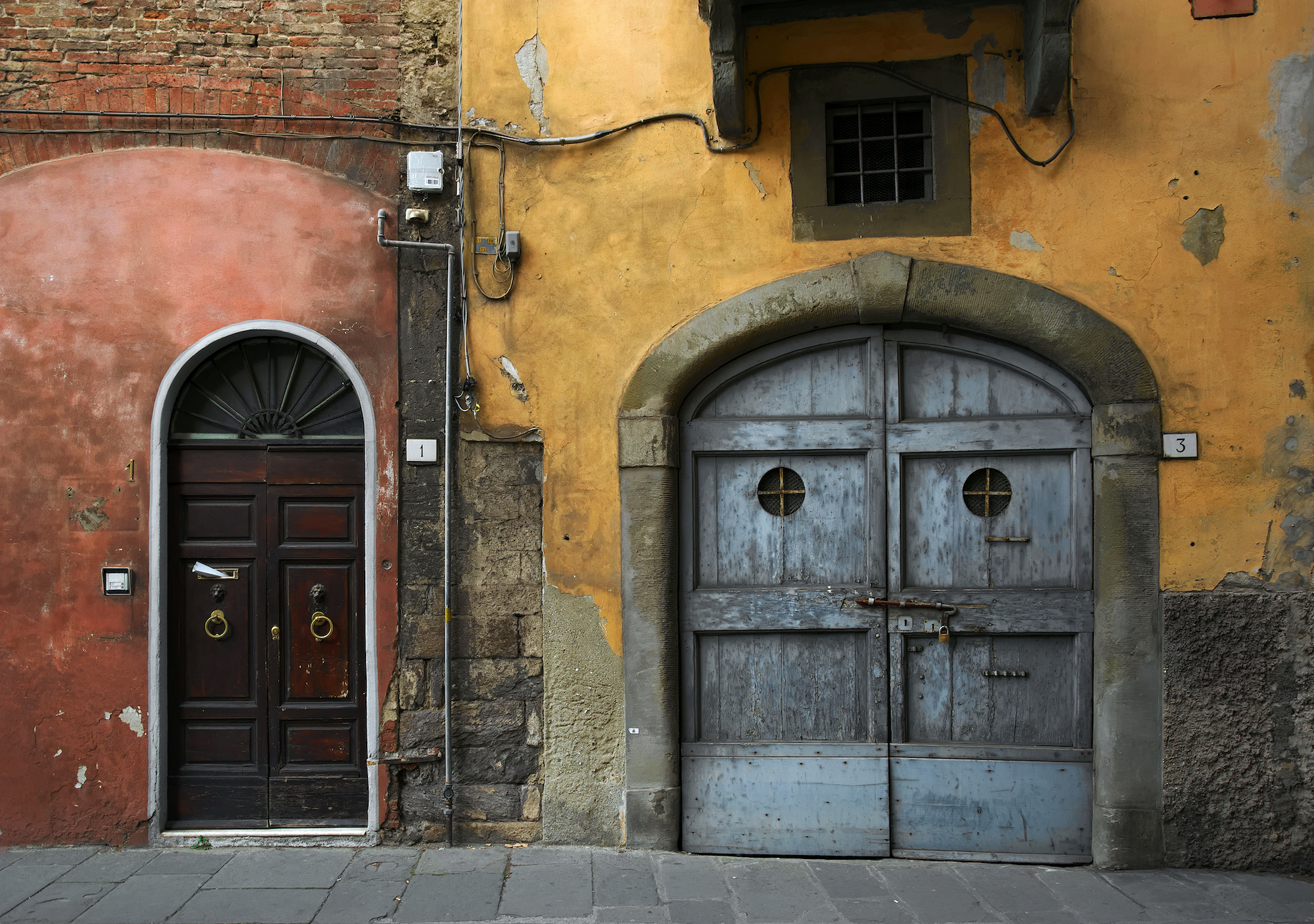 Doorways in Pisa, Italy