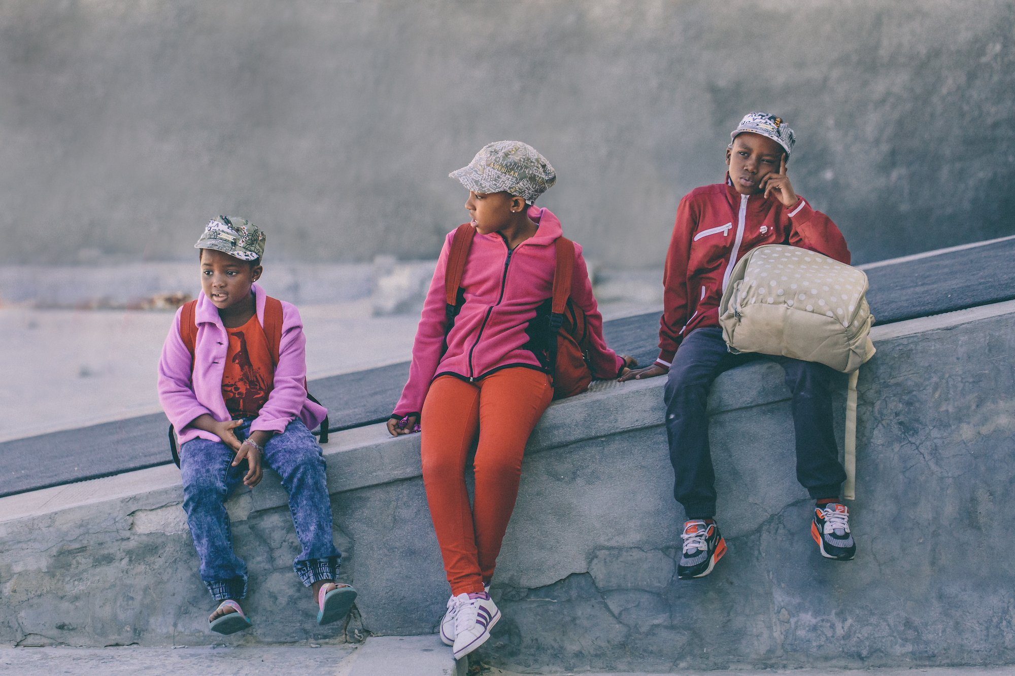 3 kids waiting in Cape Town, South Africa