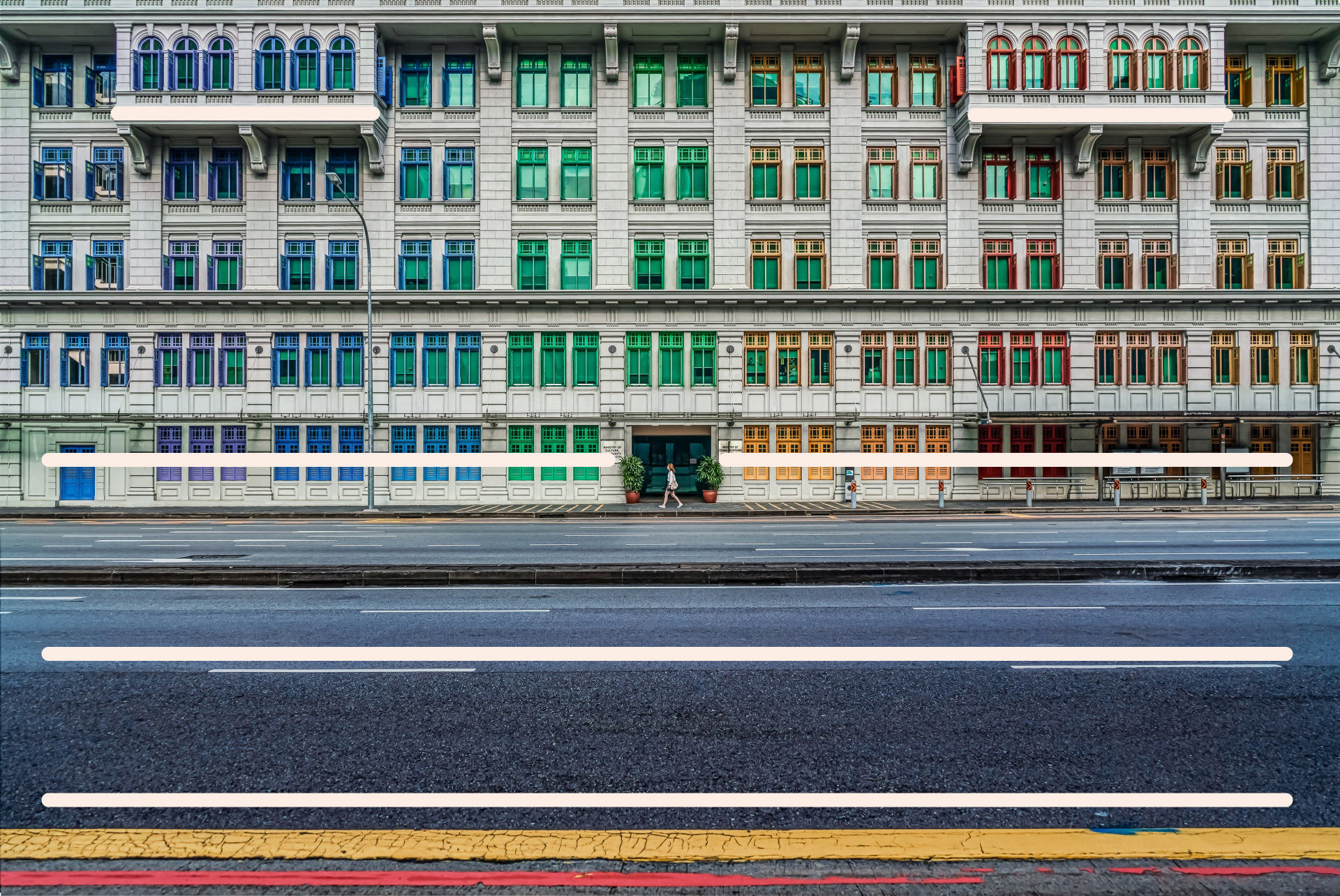 The colourful windows of a building in Singapore with added leading lines to show the compositional technique