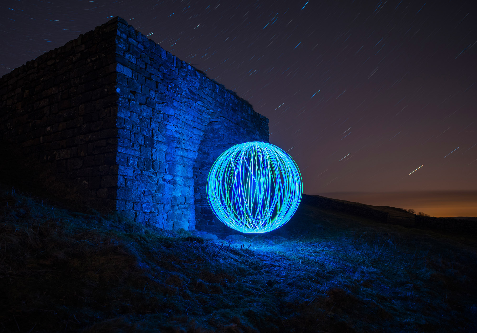 Light orb painting night photography at Hadrian's Wall, Northumberland, England
