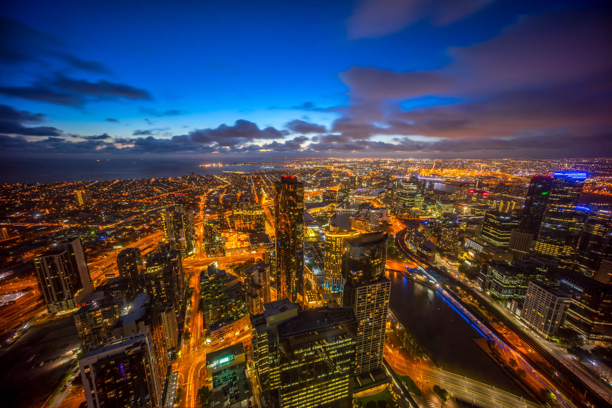 Aerial view of a dramatic sunset over Melbourne city skyline