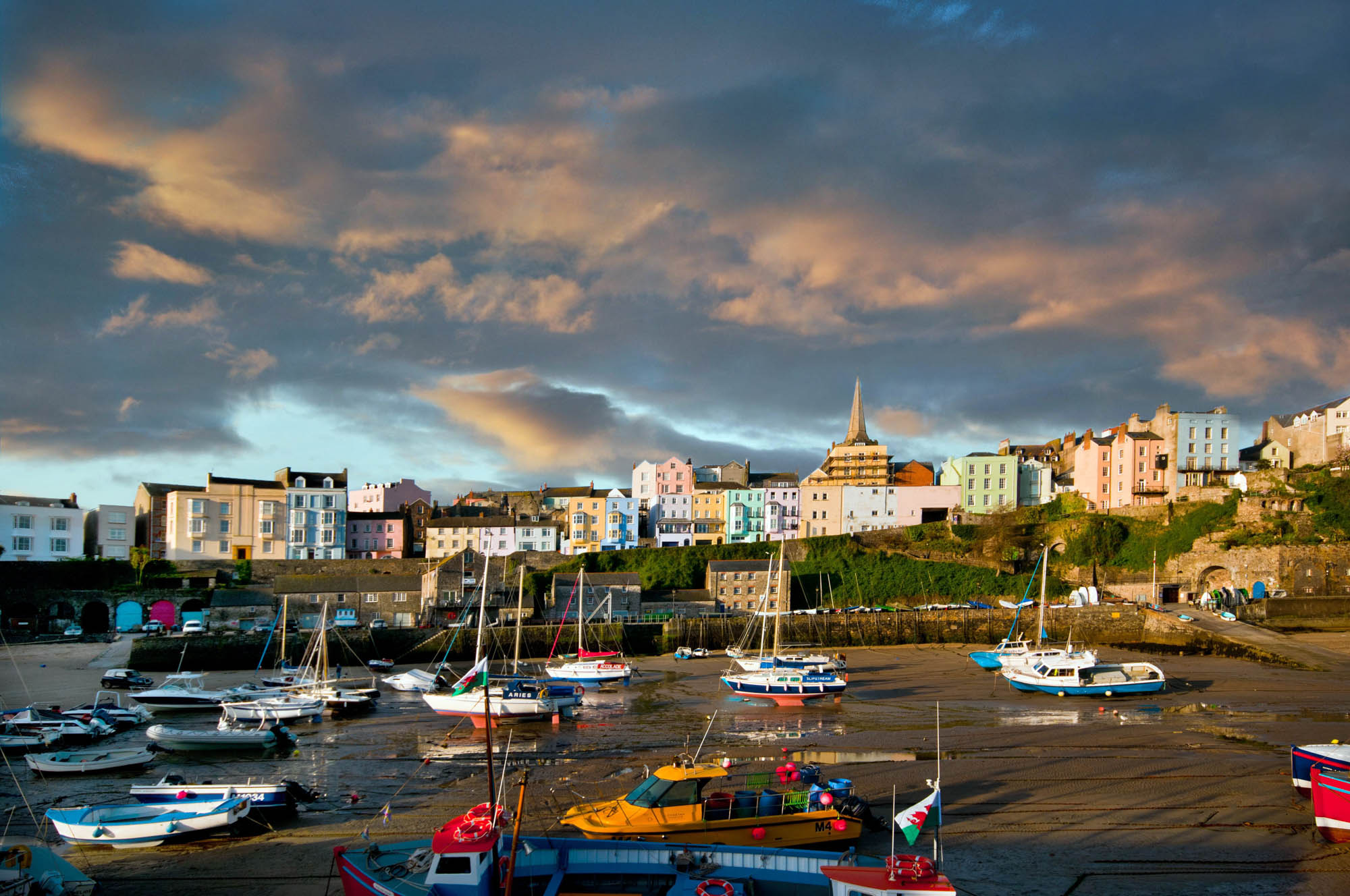 Sunrise over the beach front at Tenby, West Wales.