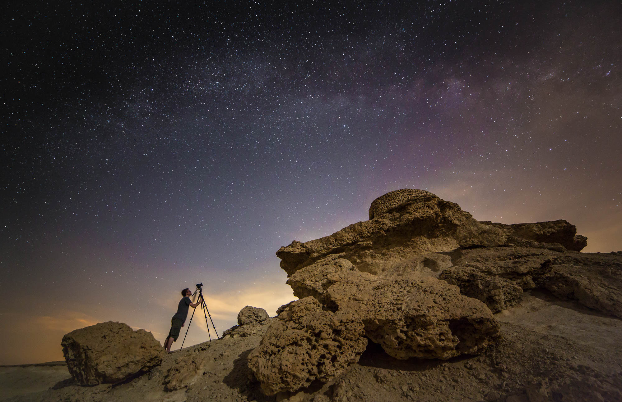 Photographer capturing the night sky