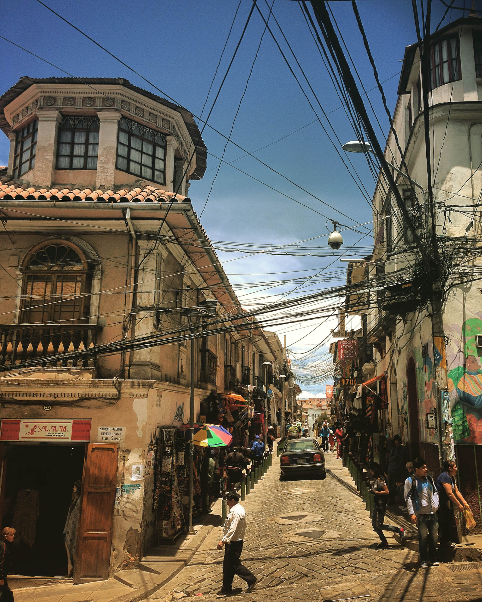 Little street packed with souvenir shops in the city of La Paz, Bolivia captured on an iPhone 5