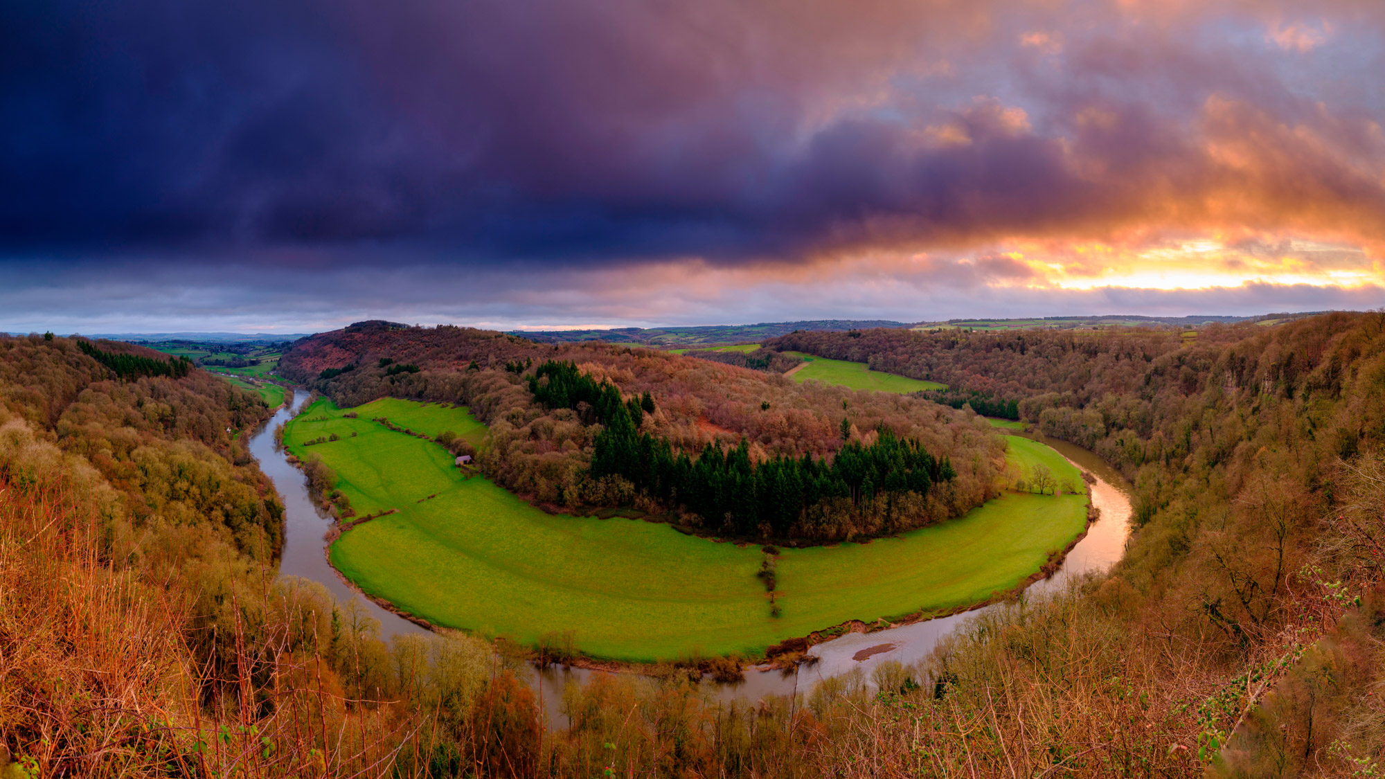 Winter sunrise over the River Wye from Symonds Yat Rock viewpoint, UK.